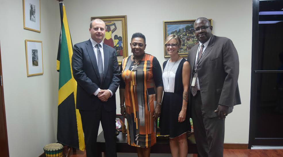 Honourable Olivia Grange, Sport Minister and (right) Carey Brown, Executive Director, Jamaica Anti-Doping Commission (JADCO), recently met with (left) Tom May, Deputy Director, NADO/RADO Relations of the World Anti-Doping Agency (WADA) and (second right) Karine Henrie, Manager, Anti-Doping Initiatives, to review the outcomes of the partnership and assistance programme offered by the Canadian Centre for Ethics in Sports (CCES) to JADCO. The meeting took place at the Ministry of Culture, Gender, Entertainment and Sport on Wednesday, July 20, 2016.