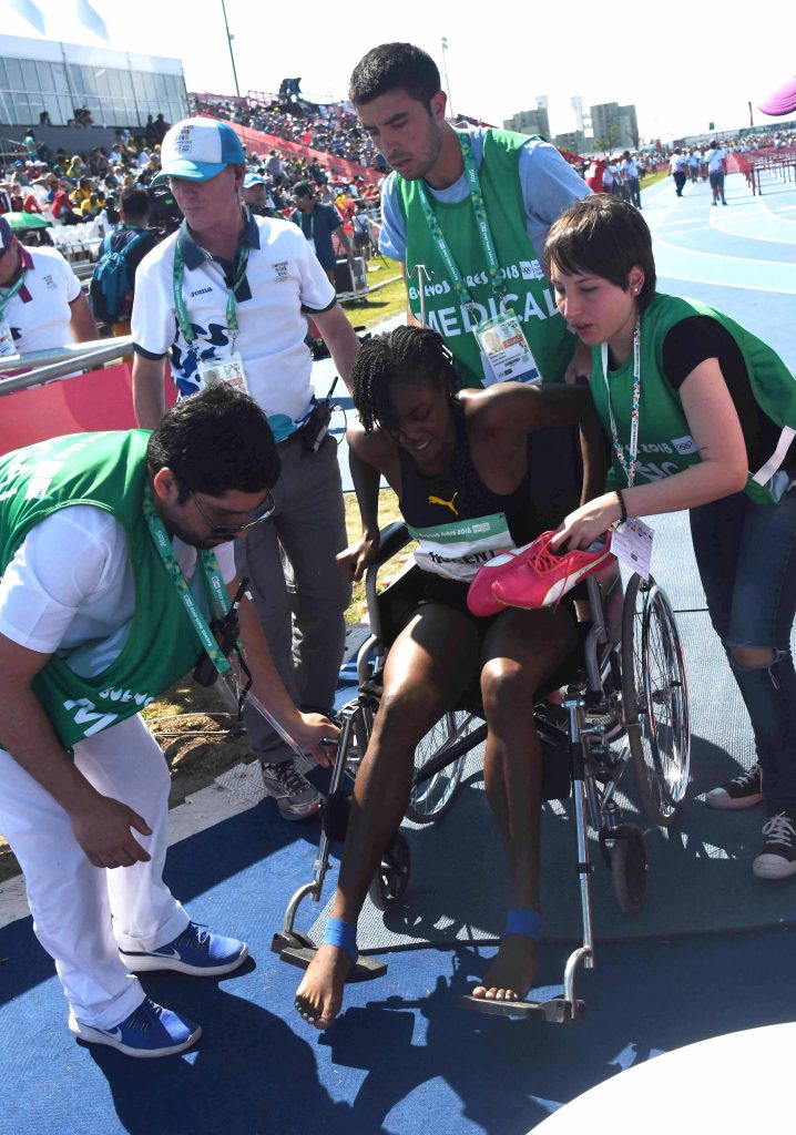 Ackera Nugent in a wheelchair after running 12.96 at the 2018 Youth Olympics