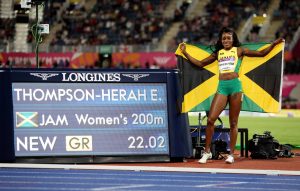 Jamaica's Elaine Thompson-Herah celebrates winning gold and a new Commonwealth Games record 22.02