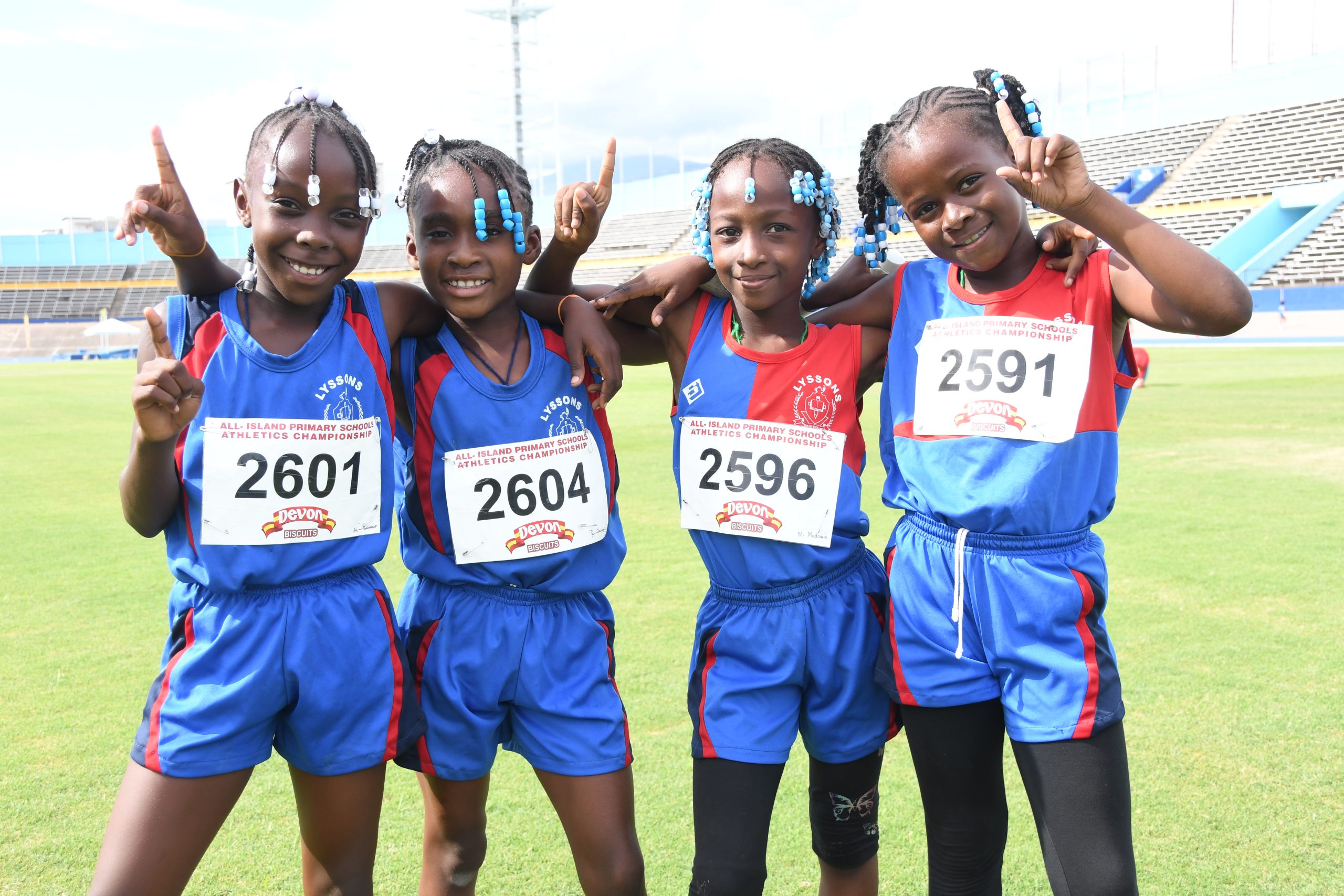 Lyssons captured the girls 6-8 4x100 relay in an impressive 1:00.79 and they posed for the cameras from left: Kathalia Roberts, Angelika Spike, Melanie Madourie and Demoya Deans.